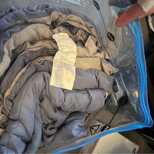 King size synthetic quilt insert with reversible colors.